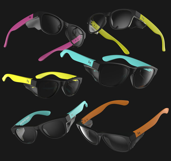 Collection of colorful Hyspecs eyewear with black lenses on a black background