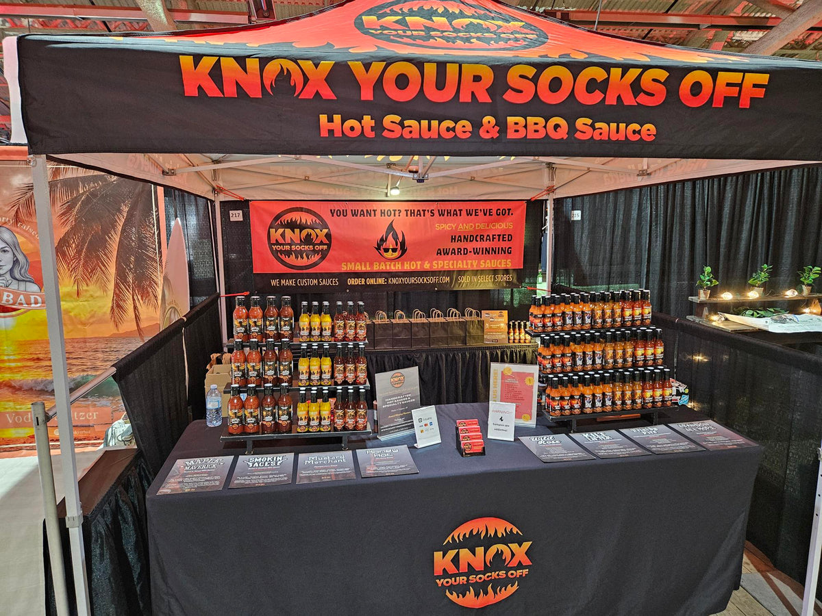 Knox Your Socks Off hot sauce booth at a Calgary market