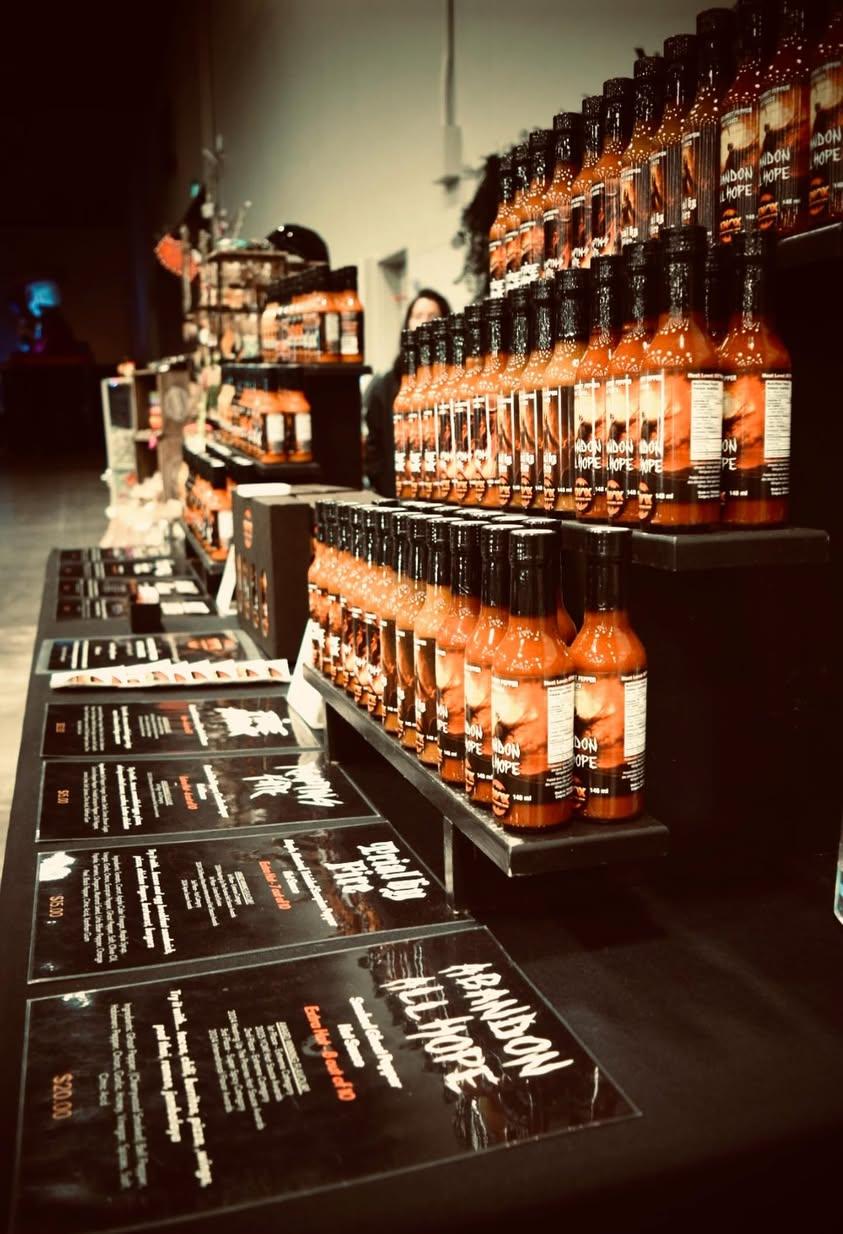 Rows of Knox Your Socks Off hot sauce bottles on display